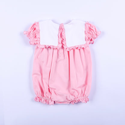Back view of pink baby girl embroidered bubble romper featuring a white square bib collar with ruffles.
