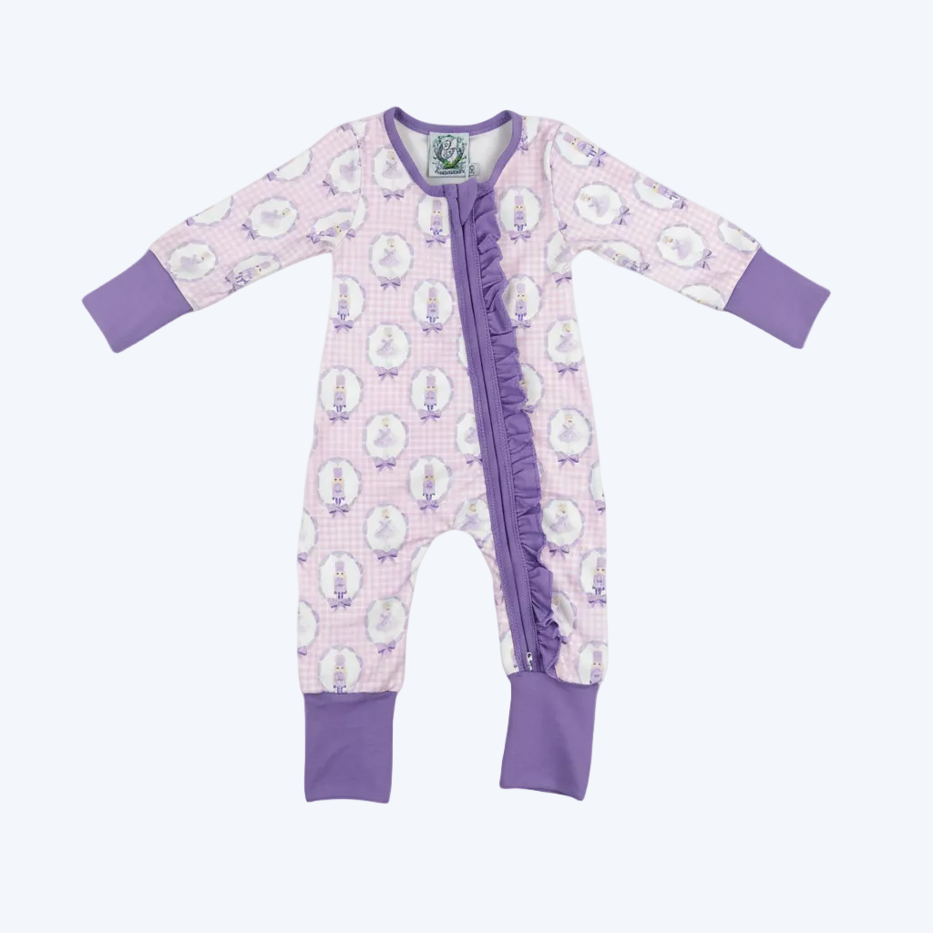 Flat lay view of the purple Nutcracker ballet ruffle girls zippy boutique bamboo pajama on white background.
