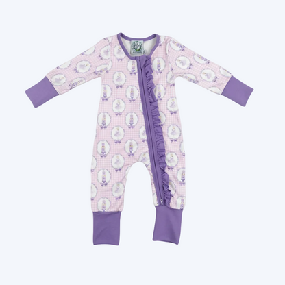 Flat lay view of the purple Nutcracker ballet ruffle girls zippy boutique bamboo pajama on white background.