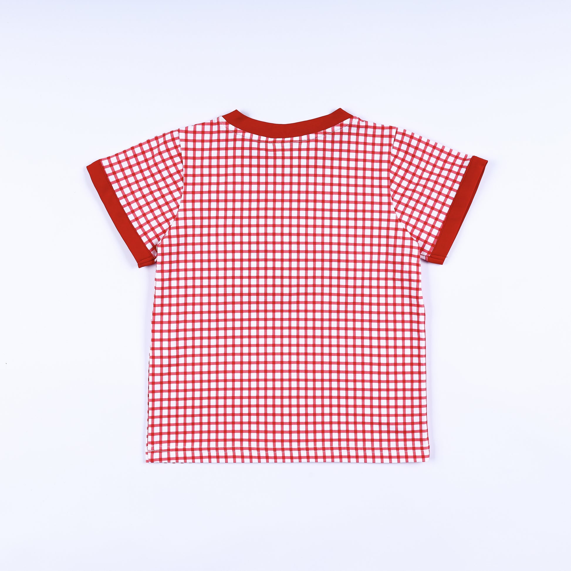 Full back view of red gingham check short sleeve boys t-shirt with red knit collar trim and sleeve accents.