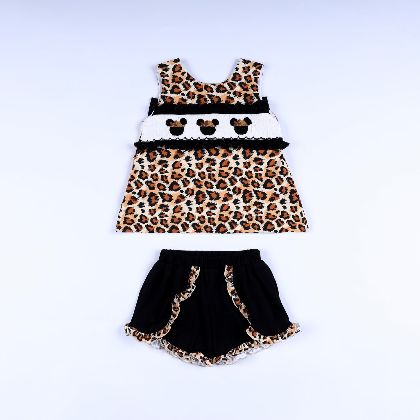 Girls animal kingdom safari mouse hand smocked sleeveless top paired with black ruffle trim shorts set.