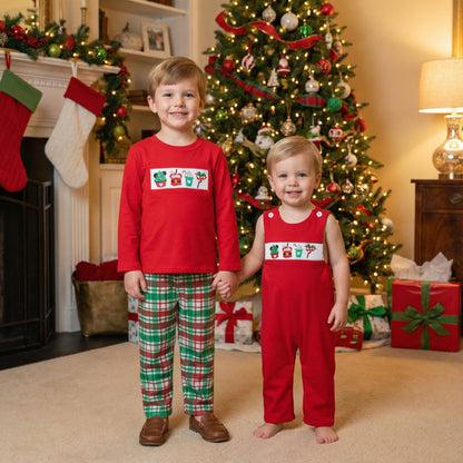 Brothers by tree wearing Smocked Boys Christmas Magical Character Treats set and matching red longall.