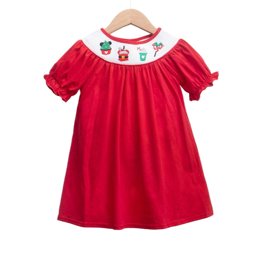 Red smocked girls Christmas dress featuring a white bishop collar with embroidered Mickey Mouse and holiday treats.