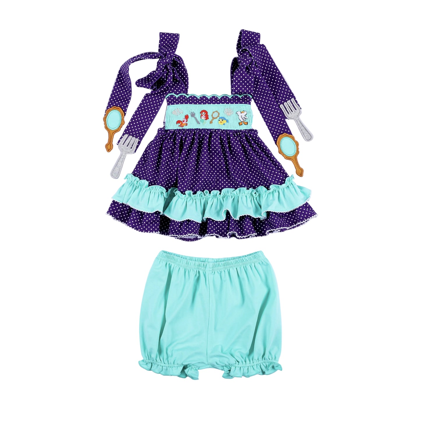 Full front view of Under The Sea hand smocked purple polka dot top and mint green bloomer set for toddlers.