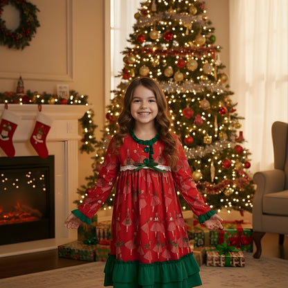 Girl wearing Vintage Christmas Lady Icons long sleeve nightgown with green ruffle trim in front of Christmas tree.