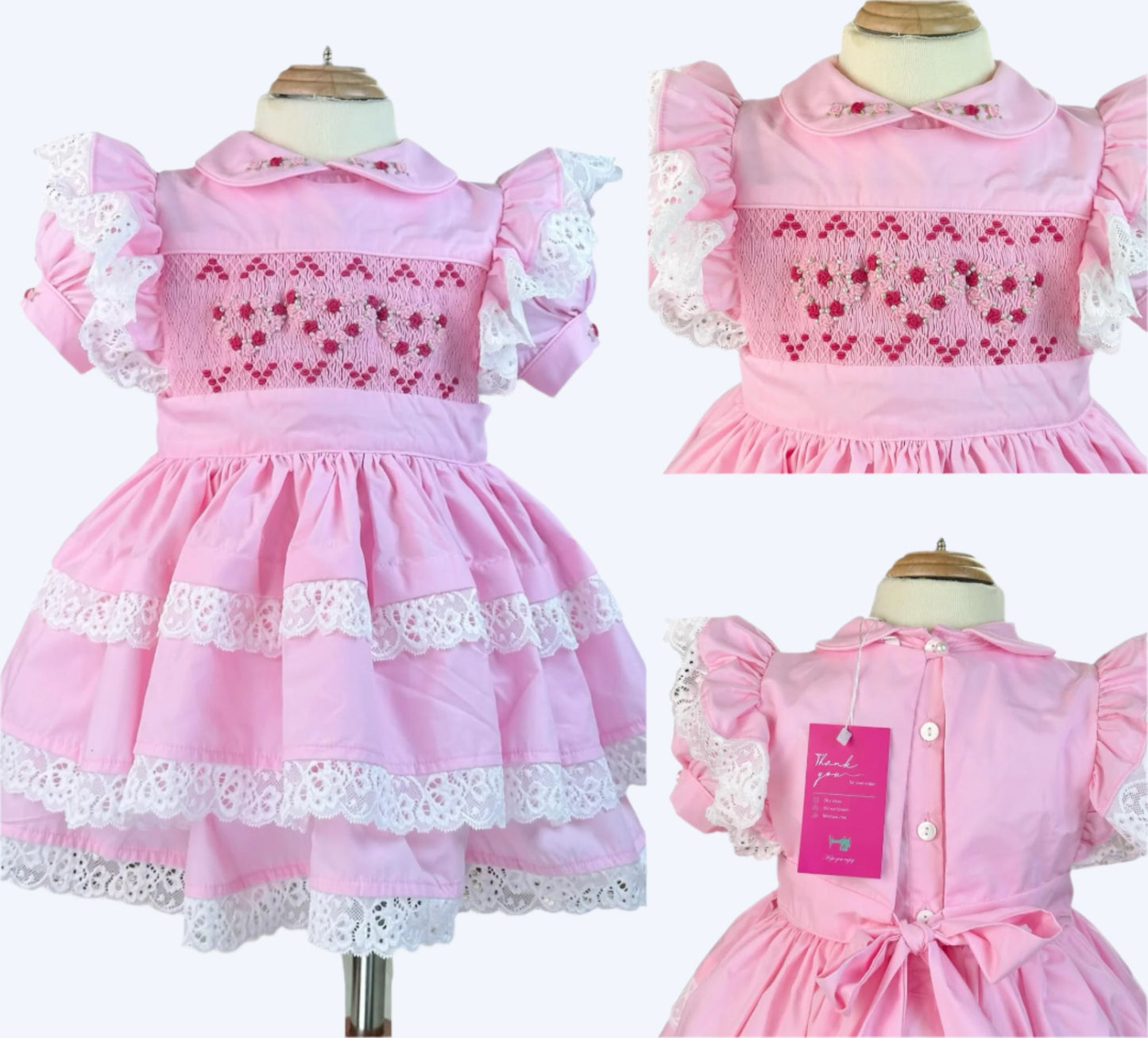 Pink Vintage Valentine Heirloom Dress featuring hand-smocked red hearts, embroidered rosebuds & delicate lace tiers.